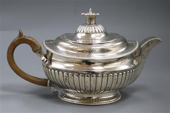 A George III silver demi fluted teapot, London, 1805, gross 23 oz.